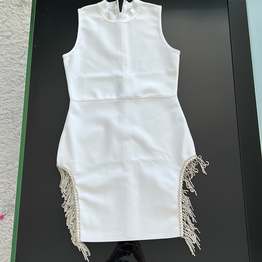 Bondage mini dress with rhinestone’s fringe.